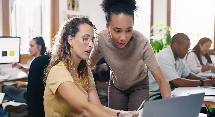 2025 Star Rating - Two women looking at a laptop