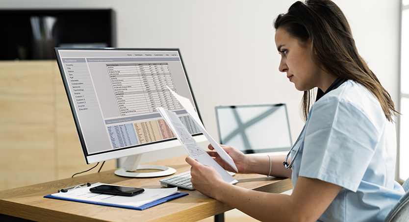 OIG Risk Adjustment Woman looking at monitor screen